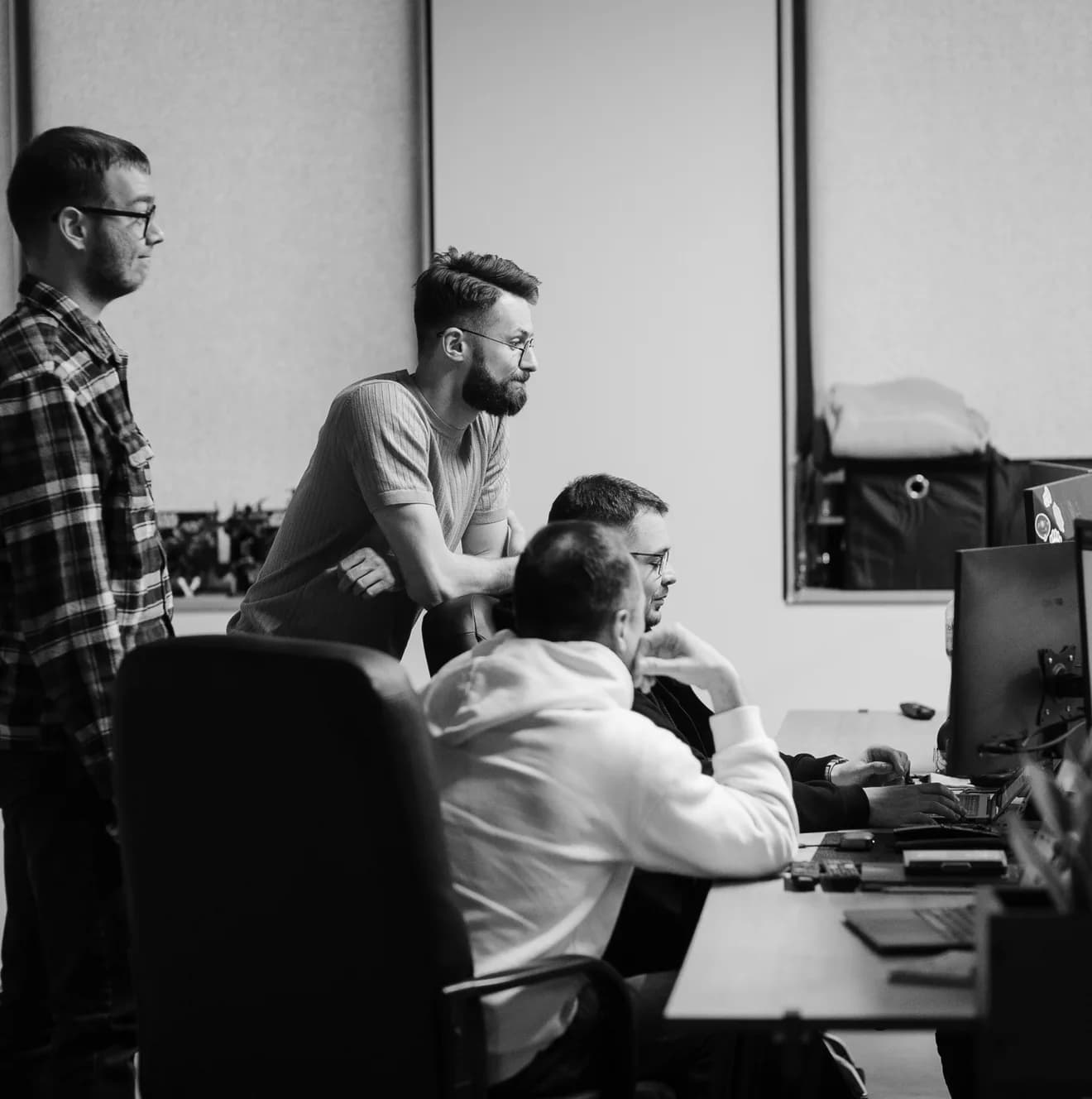 PettersonApps engineers reviewing an OTT build together