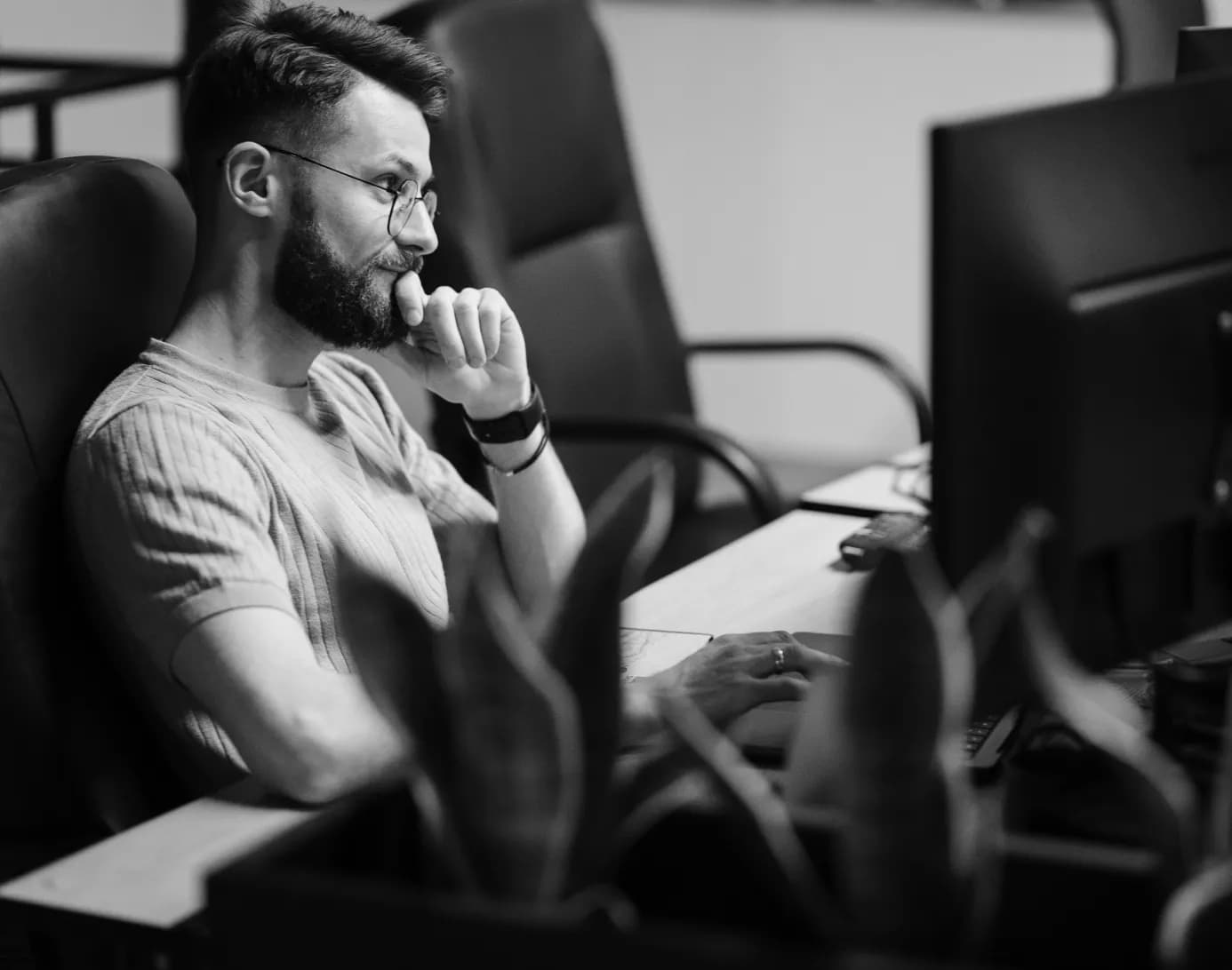 A developer at a monitor in the office