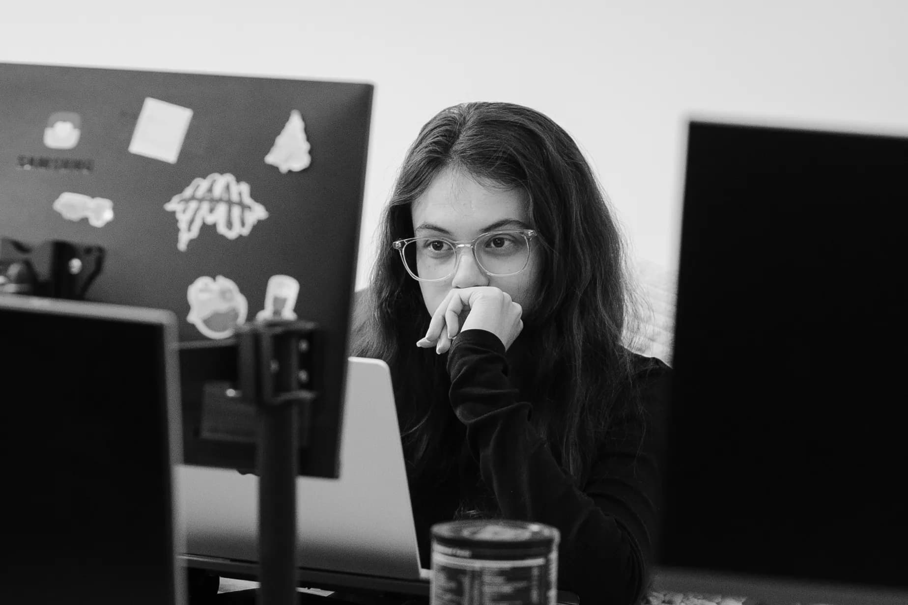 A team member focused at her desk